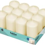 A set of 12 ivory BOLSIUS pillar candles, each 2.7x5 inches, standing upright, ready for use as elegant decor.