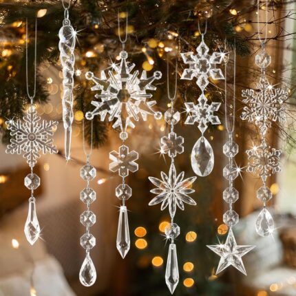 A collection of 20 clear light blue acrylic snowflake and icicle ornaments with drop pendants, ready to hang.