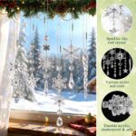 A collection of 20 clear light blue acrylic snowflake and icicle ornaments with drop pendants, ready to hang.
