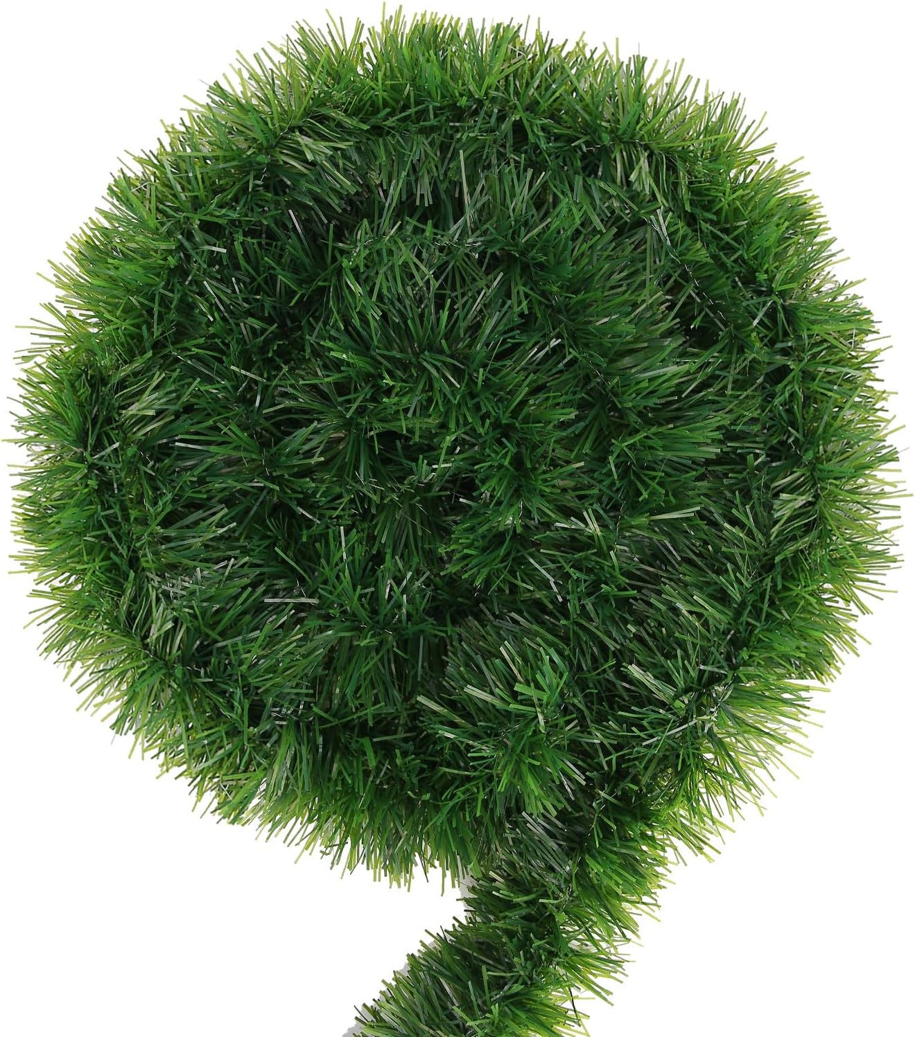 hongsome-50ft-green-christmas-tinsel-garland-non-lit-holiday-decor-for-indoor-outdoor-01 A long, lush green tinsel Christmas garland, non-lit, draped over a mantelpiece with a fireplace below.