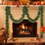 A long, lush green tinsel Christmas garland, non-lit, draped over a mantelpiece with a fireplace below.