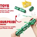 Close-up of JOYIN 10-pack red and green snowflake non-snap Christmas party favors with paper crowns and gifts visible.