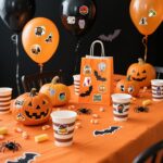 A flat lay of 100 diverse Reaeon Halloween vinyl stickers featuring pumpkins, ghosts, witches, bats, and other spooky designs