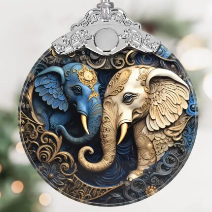 A close-up of a Touber elephant stained glass Christmas ornament hanging from a tree branch, showcasing its vibrant colors.