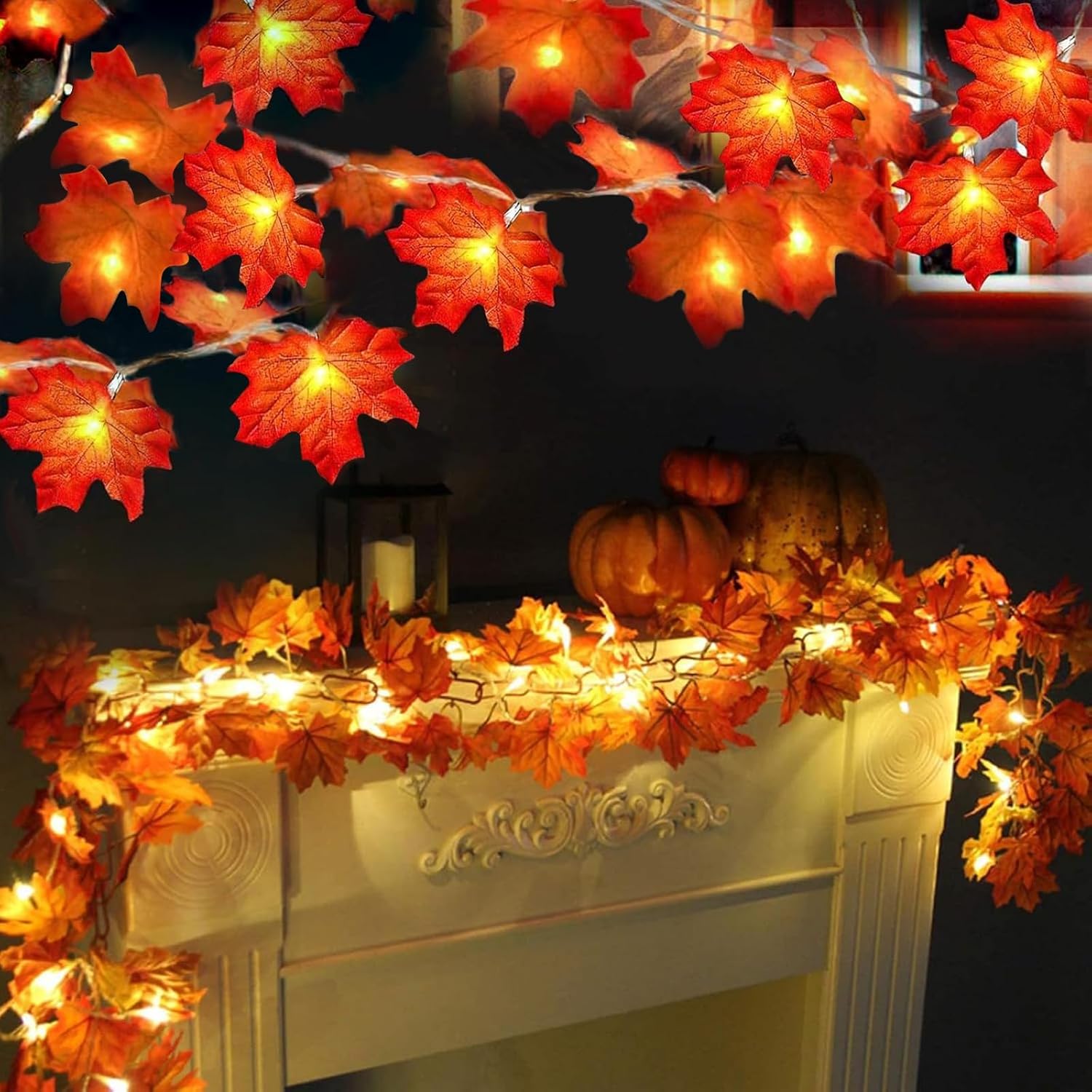 turnmeon-2-pack-20ft-fall-garland-with-40-enlarged-maple-leaf-led-lights-01 Two strands of TURNMEON fall garlands, each with 40 enlarged orange and yellow maple leaves and warm white LED lights, draped
